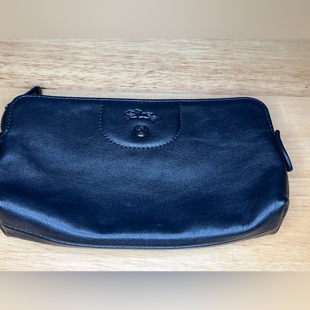 LONGCHAMP
Le Pliage Cuir Pouch